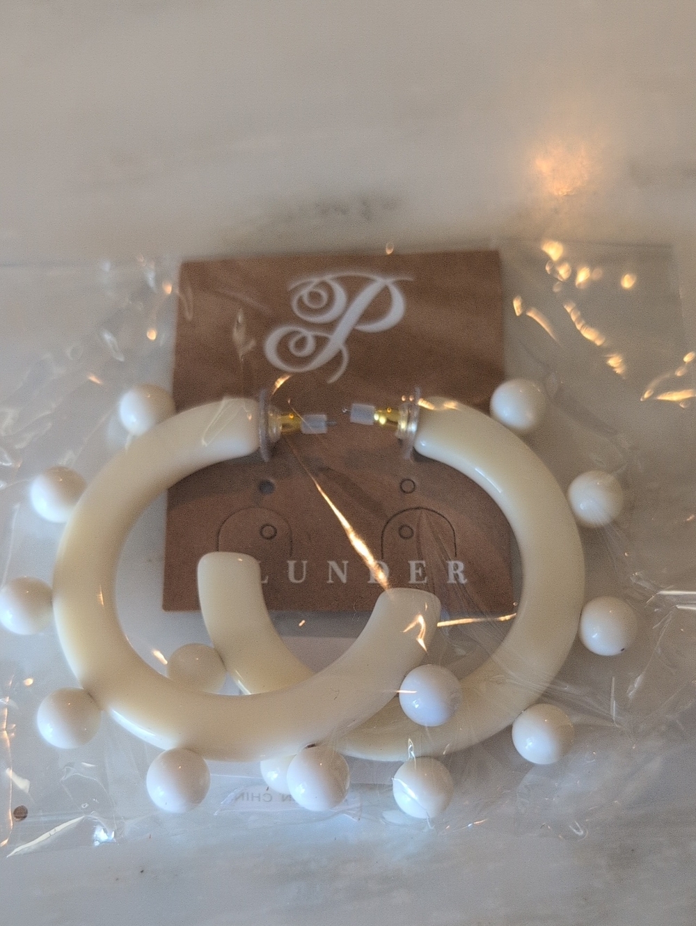 Plunder White Beaded Hoop Earrings